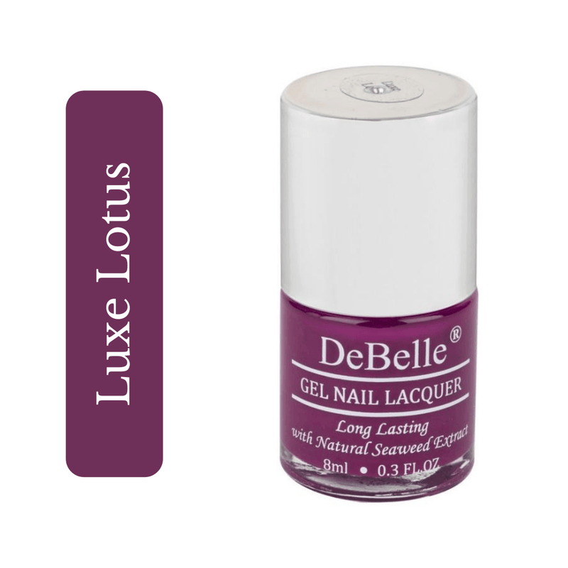 DeBelle Deep Magenta Nail polish bottle against a white background in a closer view.