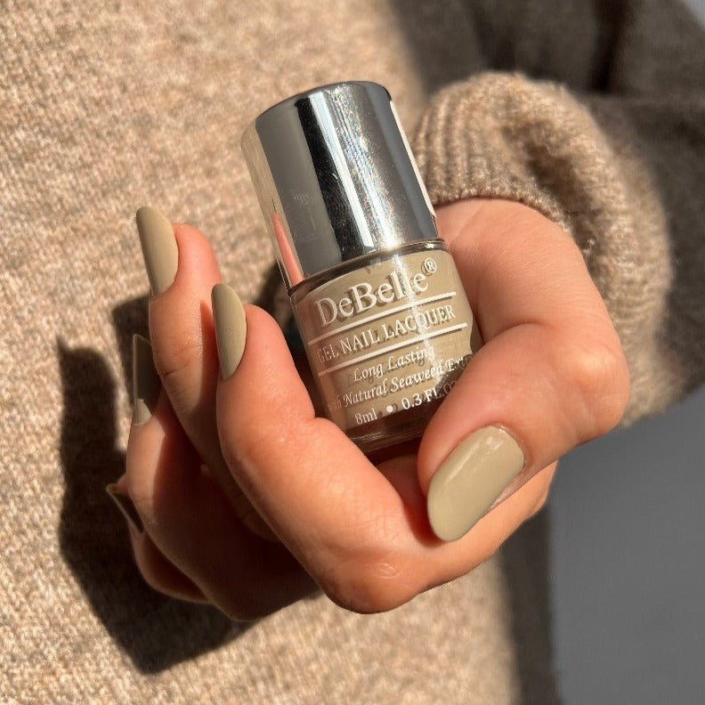 Stand out in the crowd at the new year party with this shade of dark grey with brown . This Debelle gel nail color Moonstone Bloom is available at Debelle Cosmetix Online Store.