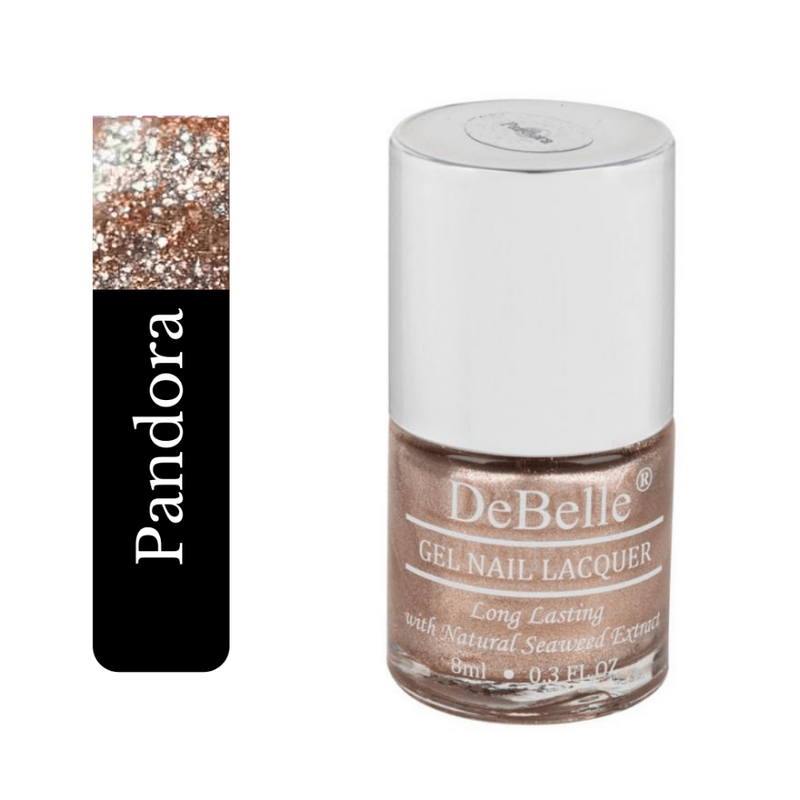 debelle rose gold glitter nail polish bottle against a white background .