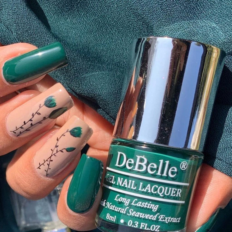 Amazing nail art with DeBelle gel nail color Hyacinth Foliothe bottle green shade. Available at DeBelle Cosmetix online store with COD facility.