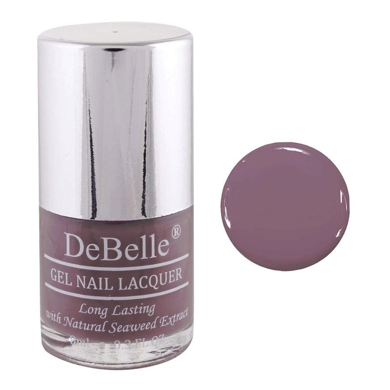 DeBelle Muted Mauve Nail Polish Bottle has white background with the color droplet