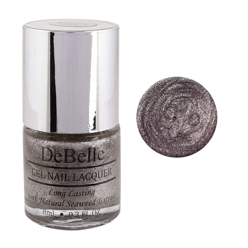 Debelle holographic silver chrome nail polish bottle with the shade against a white background