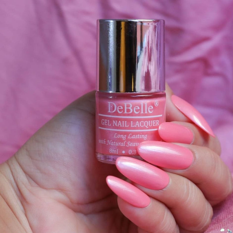 A charming shade of pink with a light shimmer that is DeBelkle gel nail color Miss Bliss. This comes in a combo pack with Majestique  mauve  an elegant shade of mauve. DeBelle Fleur De Pearl Gift Set of 2 nail polishes is available at DeBelle Cosmetix online store.