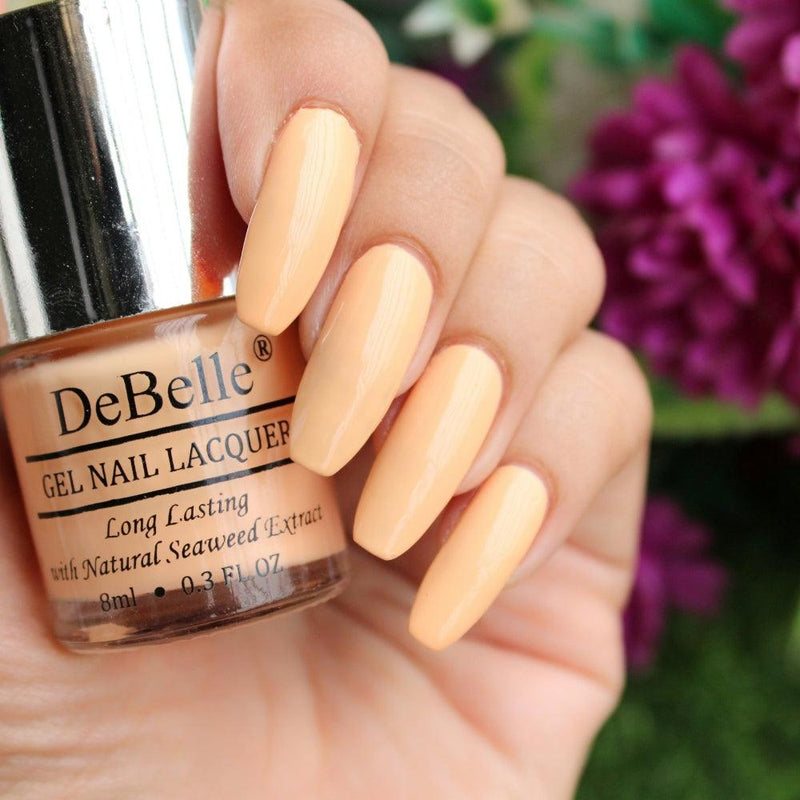 An elegant pastel shade _DeBelle gel nail color Peachy Passion. Buy online at DeBelle Cosmetix online store.