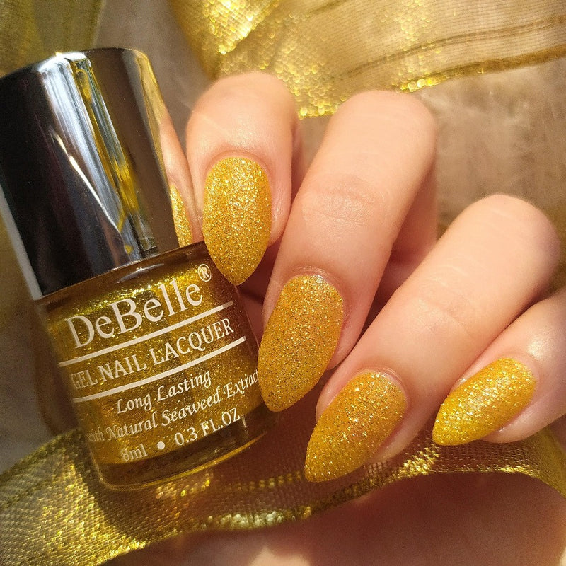 Sparkle at your nail tips with Pegasus the lime yellow gold glitter nail color . Fairuy Lumiere collection gift set is available  online at DeBelle Cosmetix online store