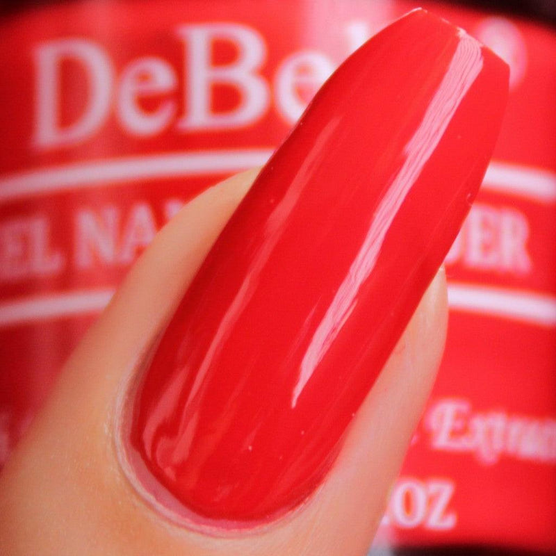 Nail painted with Scarlet Red Nail polish from Debelle with red background